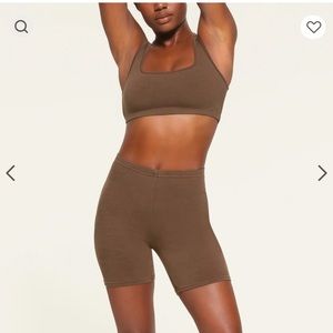 Skims biker shorts and top